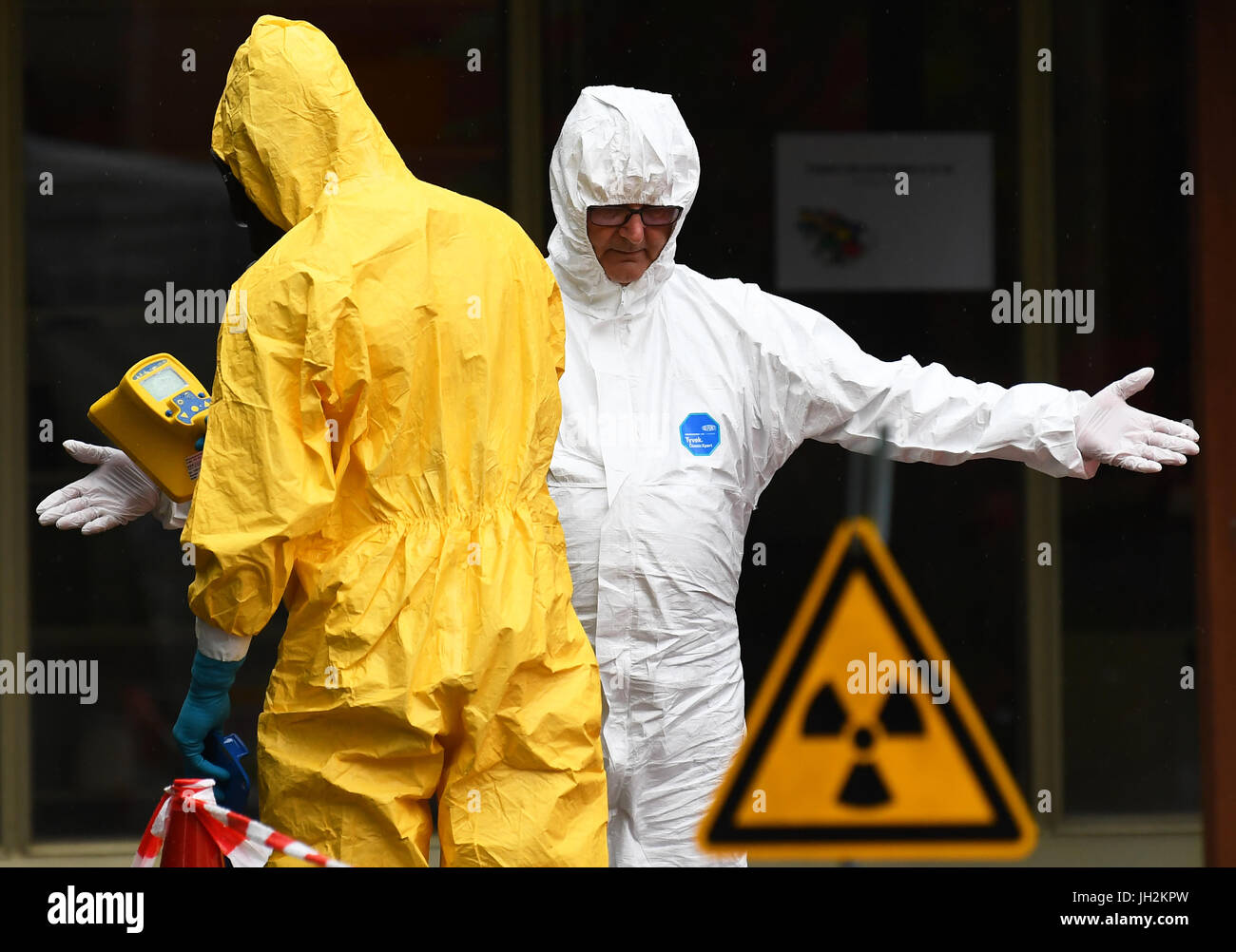 Potsdam, Germany. 12th July, 2017. A firefighter operating a radiation meter in Potsdam, Germany, 12 July 2017. The State Criminal Office, the state's radiation protection authority and the Fire Department carried out an emergency drill rehearsing the handling of radioactive substances. Photo: Ralf Hirschberger/dpa-Zentralbild/dpa/Alamy Live News Stock Photo