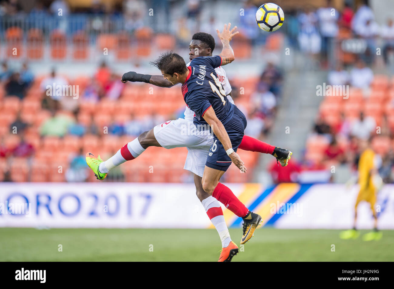 Houston, Texas, USA. 11th July, 2017. Costa Rica defender CHRISTIAN GAMBOA (16) and Canada midfielder ALPHONSO DAVIES (12) battle during the 1st half of an international CONCACAF Gold Cup soccer match between Canada and Costa Rica at BBVA Compass Stadium. The game ended in a 1-1 draw. Credit: Trask Smith/ZUMA Wire/Alamy Live News Stock Photo