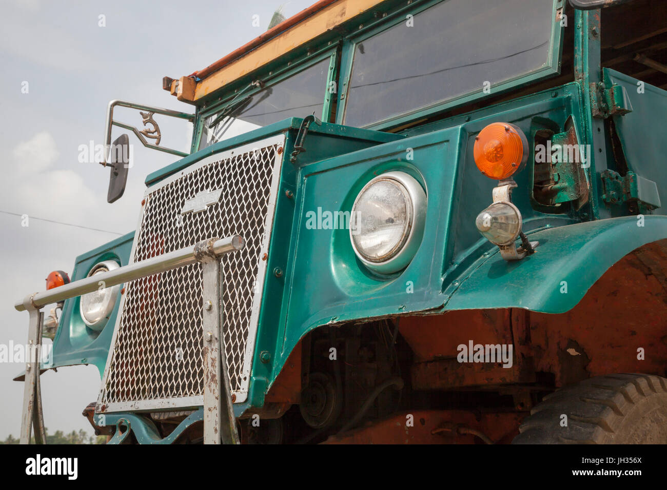 Vintage bus still in use in Myanmar. Modified from a WW2 ex British army Canadian Military Pattern Chevrolet C60 truck. Mon State, Myanmar Stock Photo