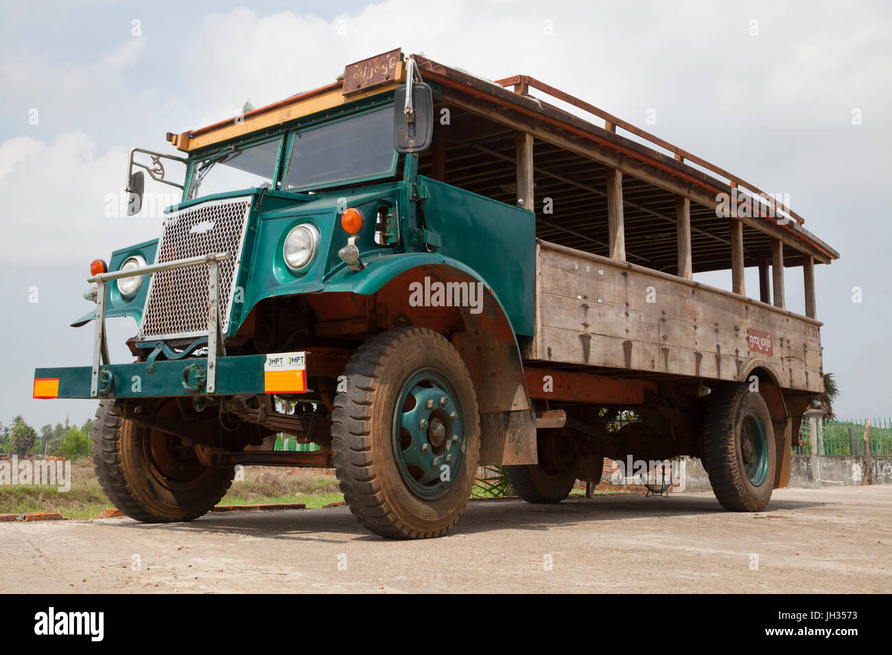 Vintage bus still in use in Myanmar. Modified from a WW2 ex British army Canadian Military Pattern Chevrolet C60 truck. Mon State, Myanmar Stock Photo