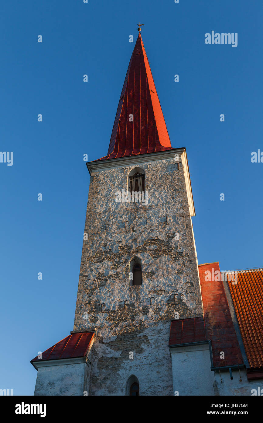 Tower of ancient Lutheran church in Kihelkonna, Saaremaa, Estonia. Early autumn sunny day. Stock Photo