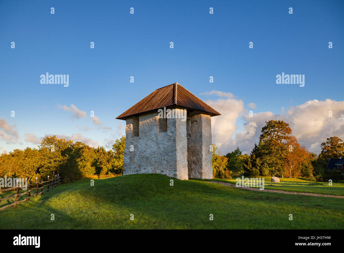 Bellfry of ancient Lutheran church in Kihelkonna, Saaremaa, Estonia. Early autumn sunny day. Stock Photo