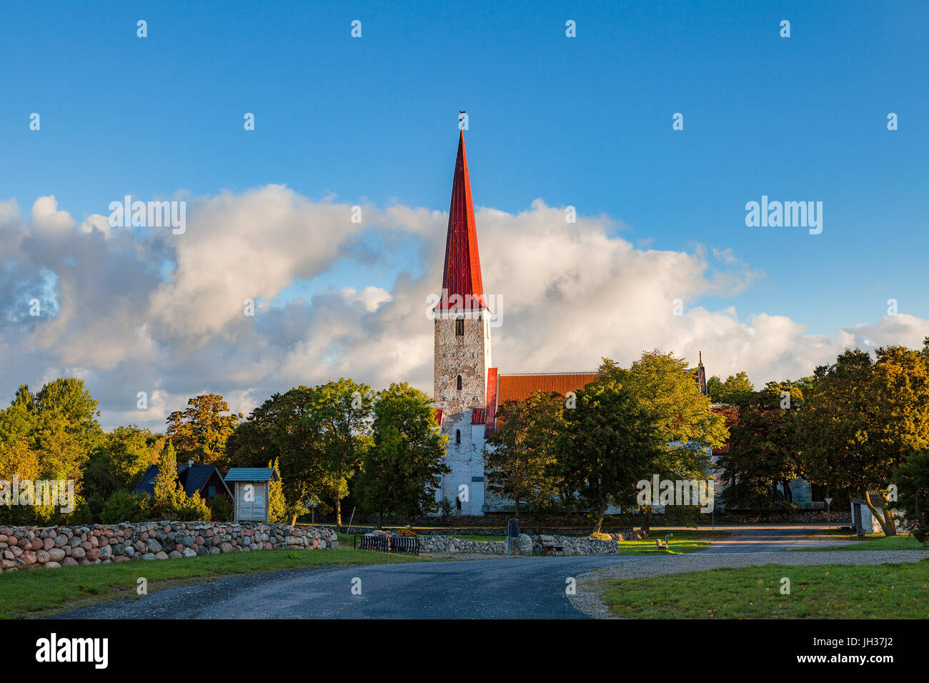 Ancient Lutheran church in Kihelkonna, Saaremaa, Estonia. Early autumn sunny day. Landscape view. Stock Photo