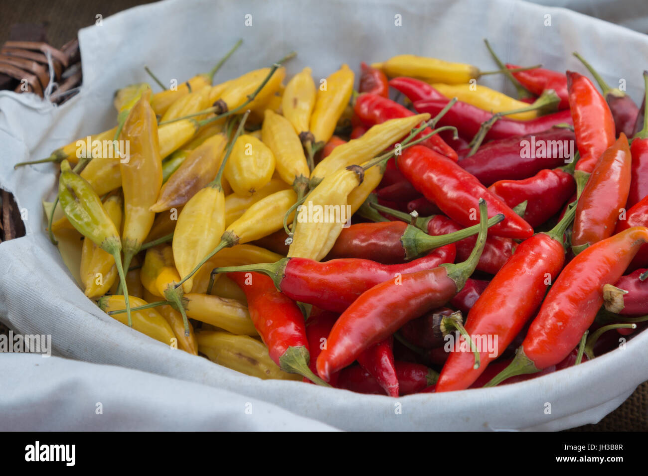 Red and Yellow Dried Chili Peppers inside White Bowl Stock Photo - Alamy