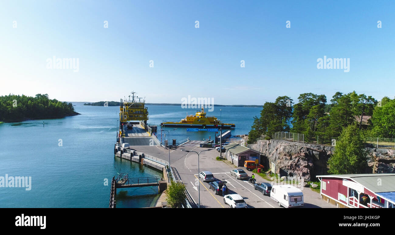 Aerial view of two cable ferrys, at a terminal, heading to houtskar and kokar, on a sunny summer day, in the finnish archipelago of Turku, Varsinais-s Stock Photo