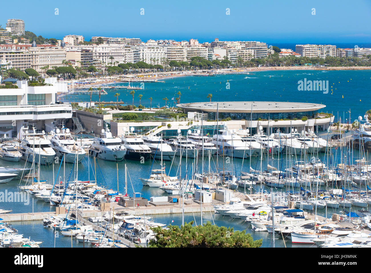 Old port and the Palais des Festivals et des Congrès with la Croisette, Cannes, France Stock Photo