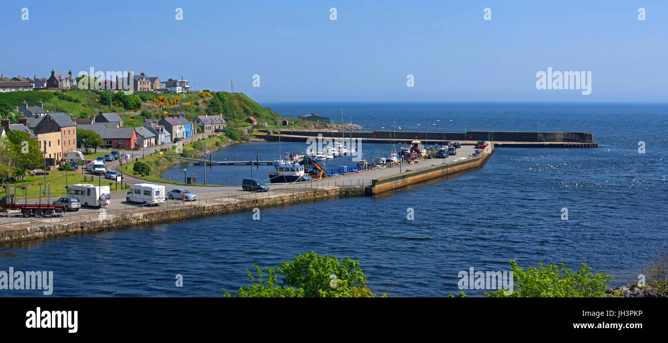 Fishing boats in the harbour at the estuary of the River Helmsdale, Sutherland, Scottish Highlands, Scotland, UK Stock Photo