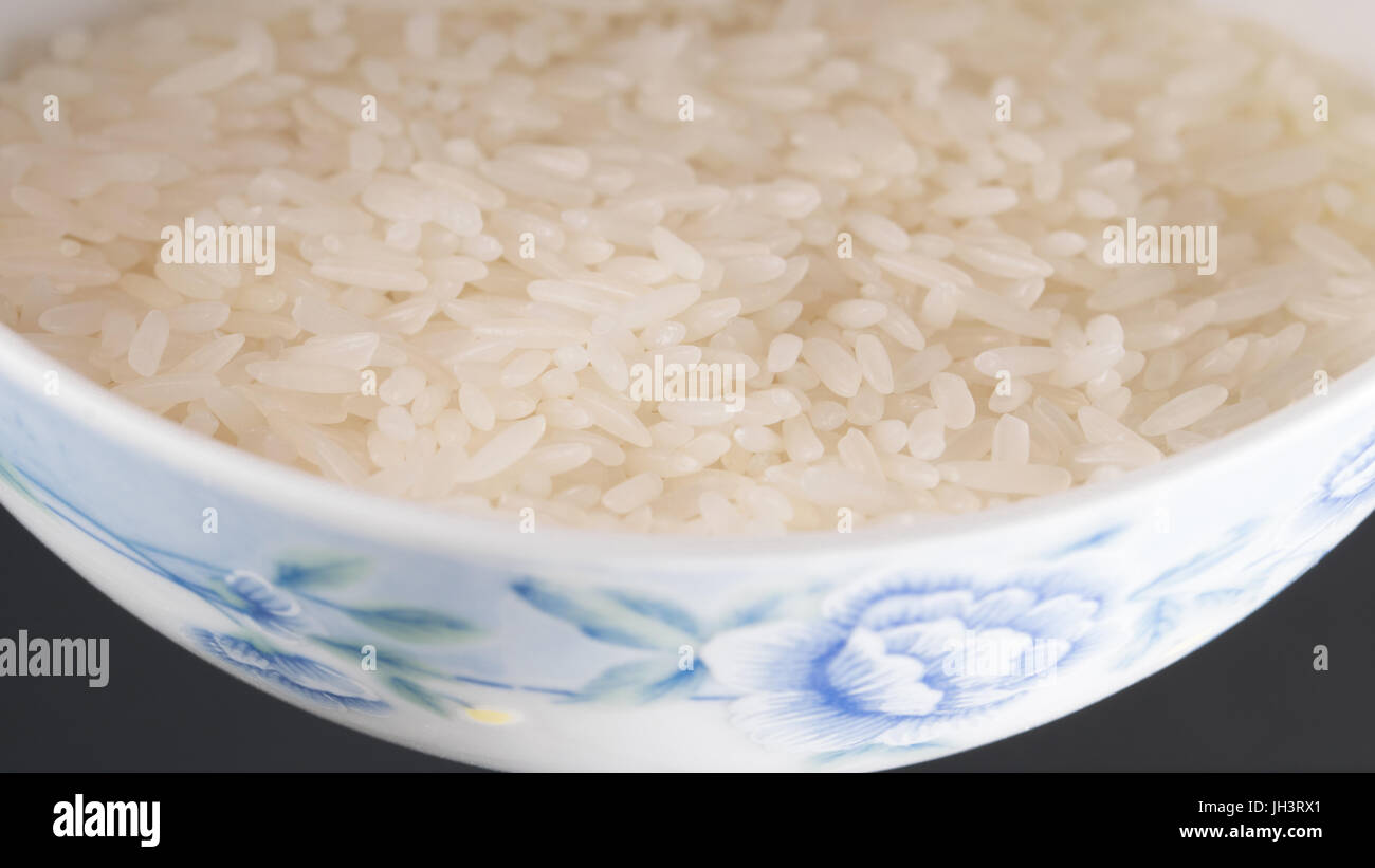 Rice in bowl Stock Photo - Alamy