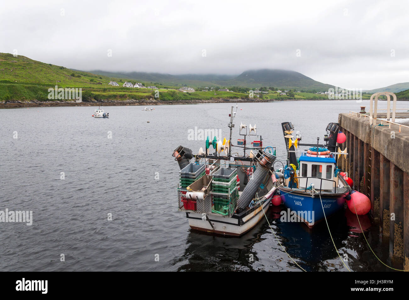Inshore fishing vessels at Teelin pier harbour, County Donegal, Ireland Stock Photo