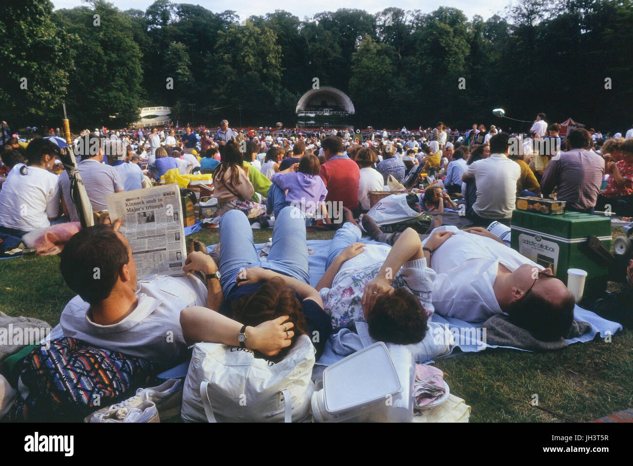 Outdoor summer concert audience, Kenwood House, Hampstead, London, England, UK. Circa 1980's Stock Photo
