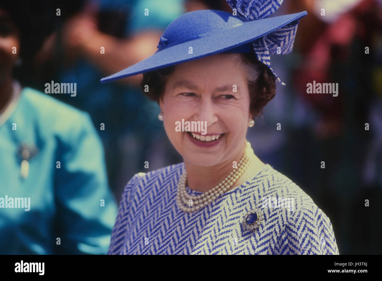 A smiling HM Queen Elizabeth II wearing a hat by Milliner Philip Somerville. Royal visit to Barbados 8-11th March 1989 Stock Photo