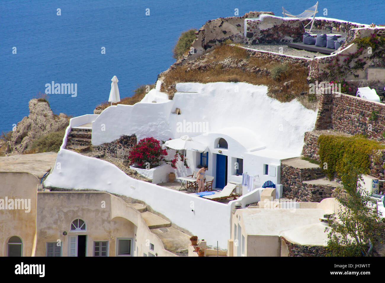 Cave appartments at the crater edge, popular accommodation at the village Oia, Santorin, Cyclades, Aegean, Greece Stock Photo