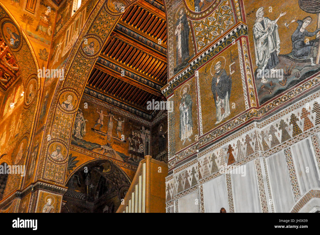 The interior of Monreale Cathedral, adorned with mosaic tiles. Stock Photo