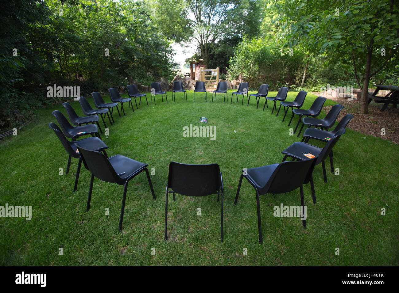 Chairs set up for Channel Therapy session, group therapy session, informal group sit in a circle and respond in turn Stock Photo