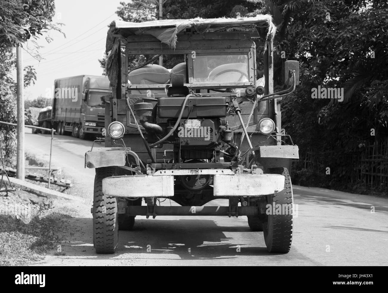 Vintage truck still in widespread use today in Myanmar. Modified from a WW2 ex British army Canadian Military Pattern (CMP) Chevrolet C60 truck Stock Photo