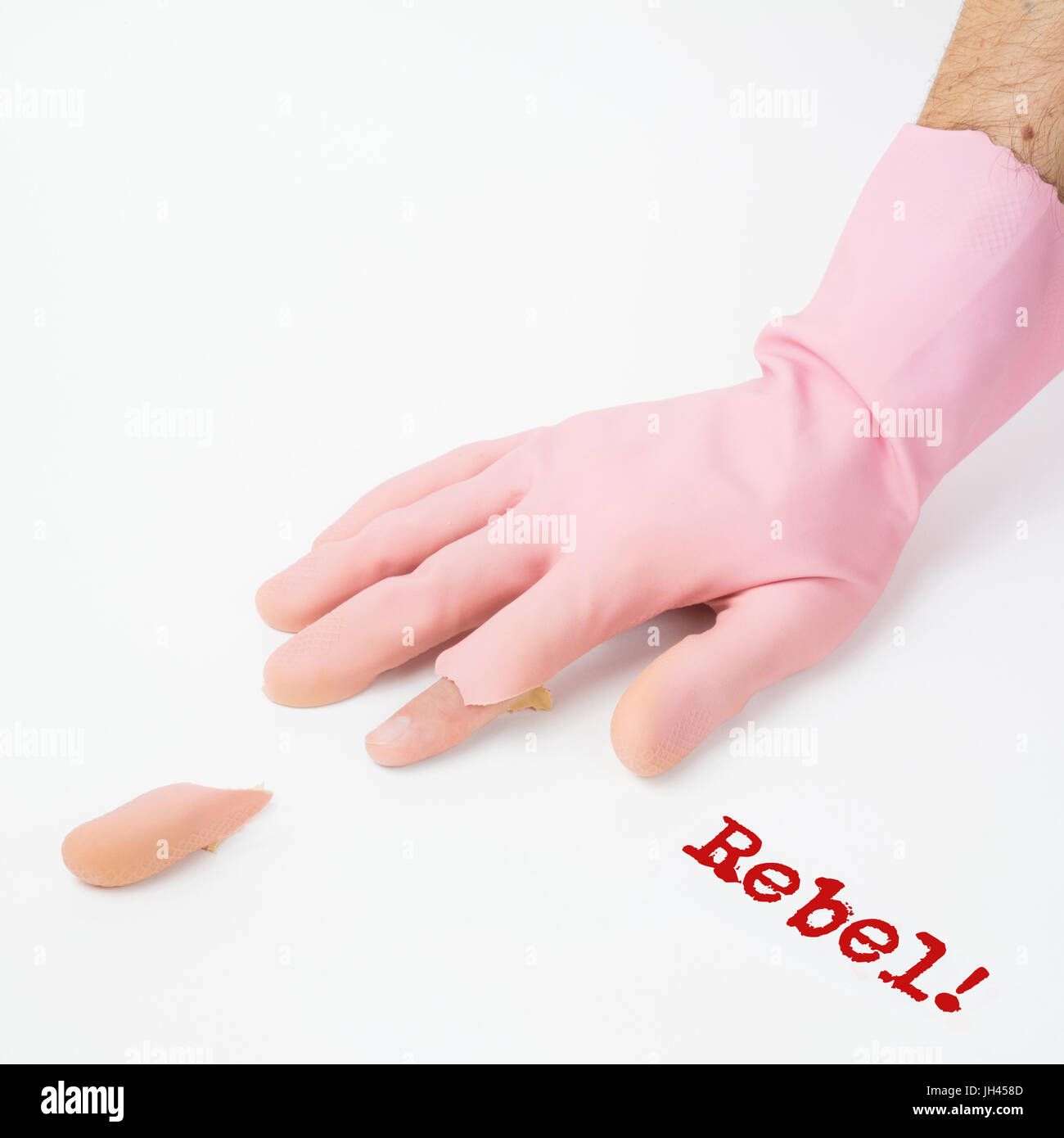 Rebel! He refuses to be a victim! He separated himself from the community. A concept made with cleaning glove. Stock Photo