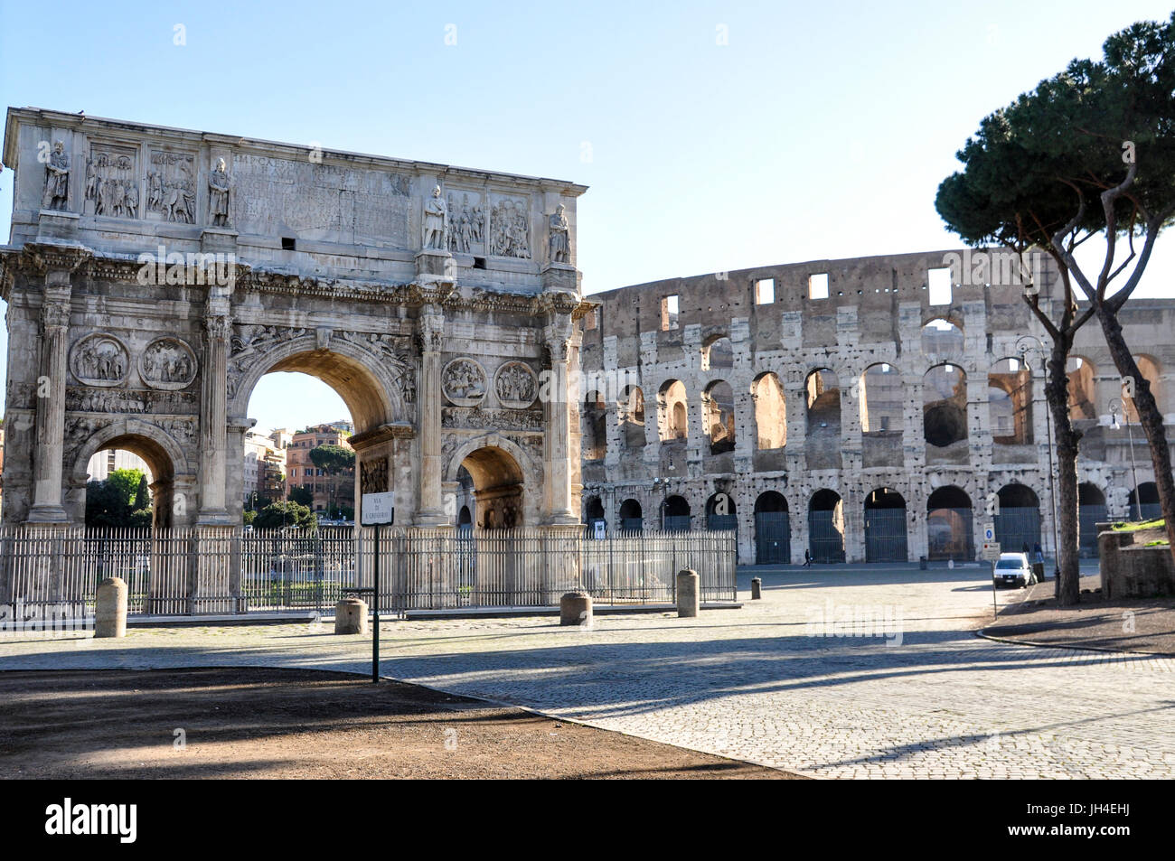 The triumphal arch, Arch of Constantine, and the Colosseum in central Rome, Italy. Stock Photo