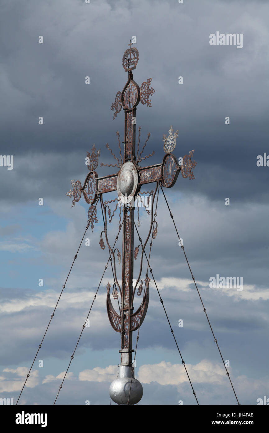 The cross and the crescent moon on the sky background aerial Stock