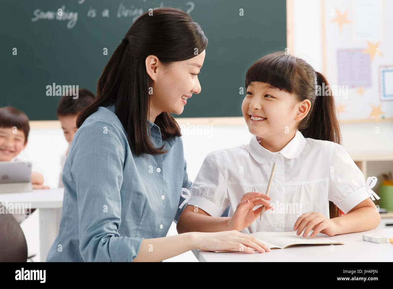 The teachers and pupils are in the classroom Stock Photo - Alamy
