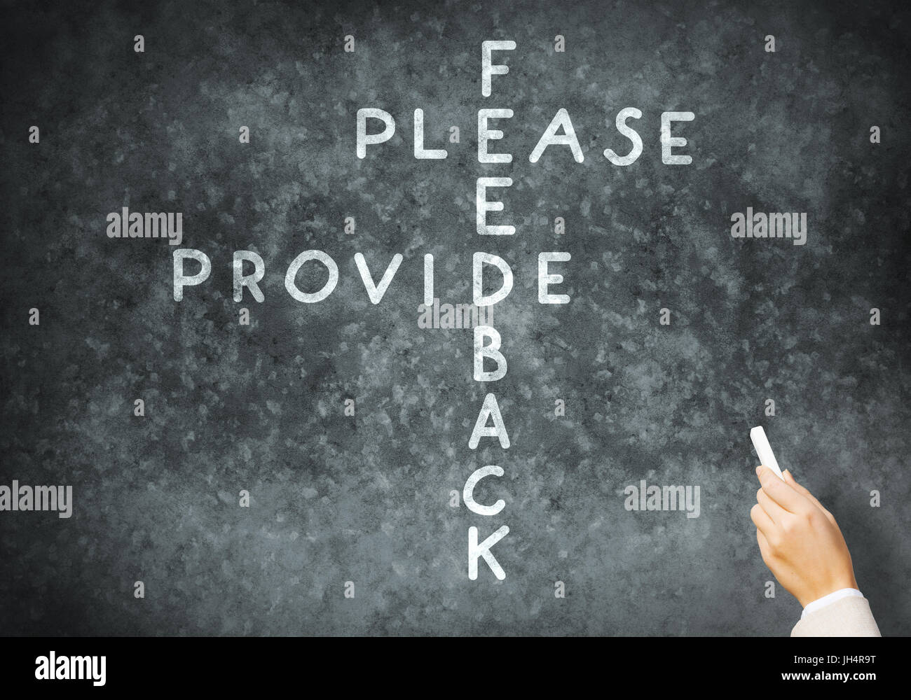Woman draw crossword Stock Photo Alamy