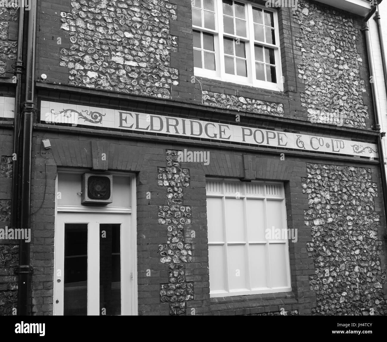Black and white image of old Eldridge Pope public house signage in Winchester, Hampshire, England, UK Stock Photo