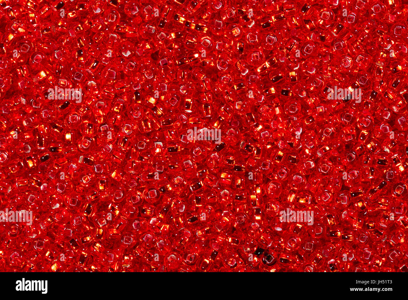 Background of bright red seed beads.  Stock Photo