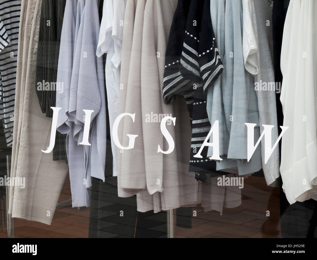 Jigsaw name in shop window ladies clothing retailer company founded in 1972 by John Robinson and Malcolm Webster Stock Photo Alamy