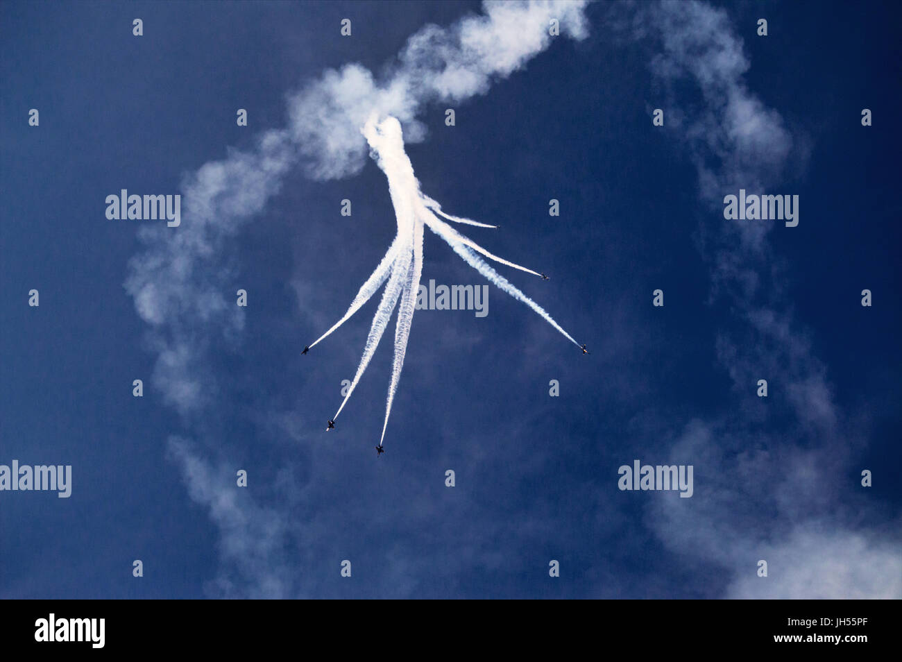 Six blue angel jets flying in formation over their home base in Florida