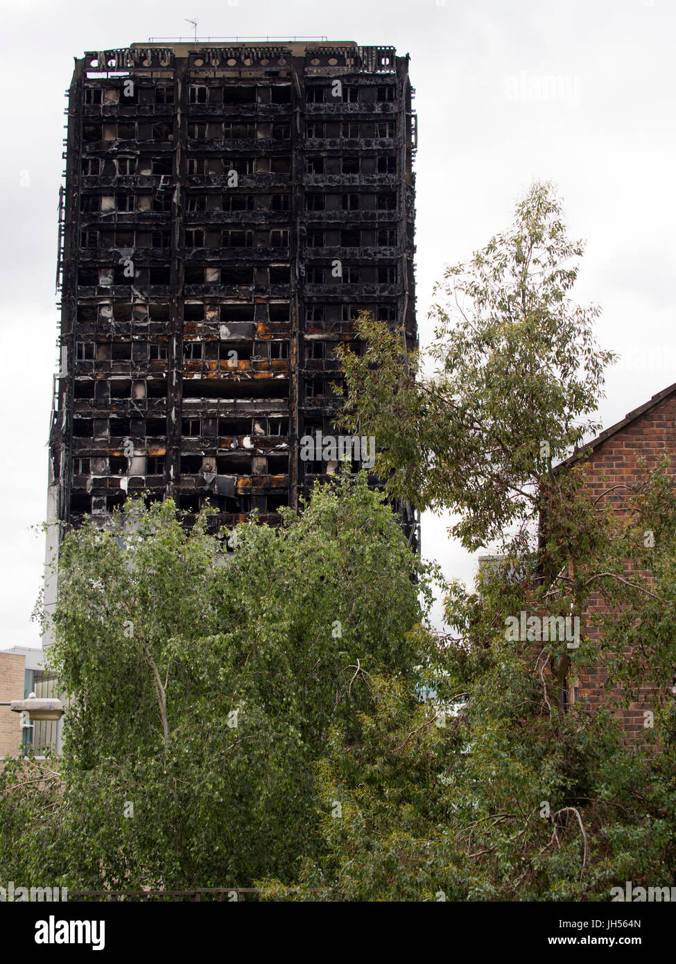 London, UK - Jul 4, 2017: The Grenfell Tower block in Kensington, West London in which at least 80 people are thought to have died following a fire. Stock Photo