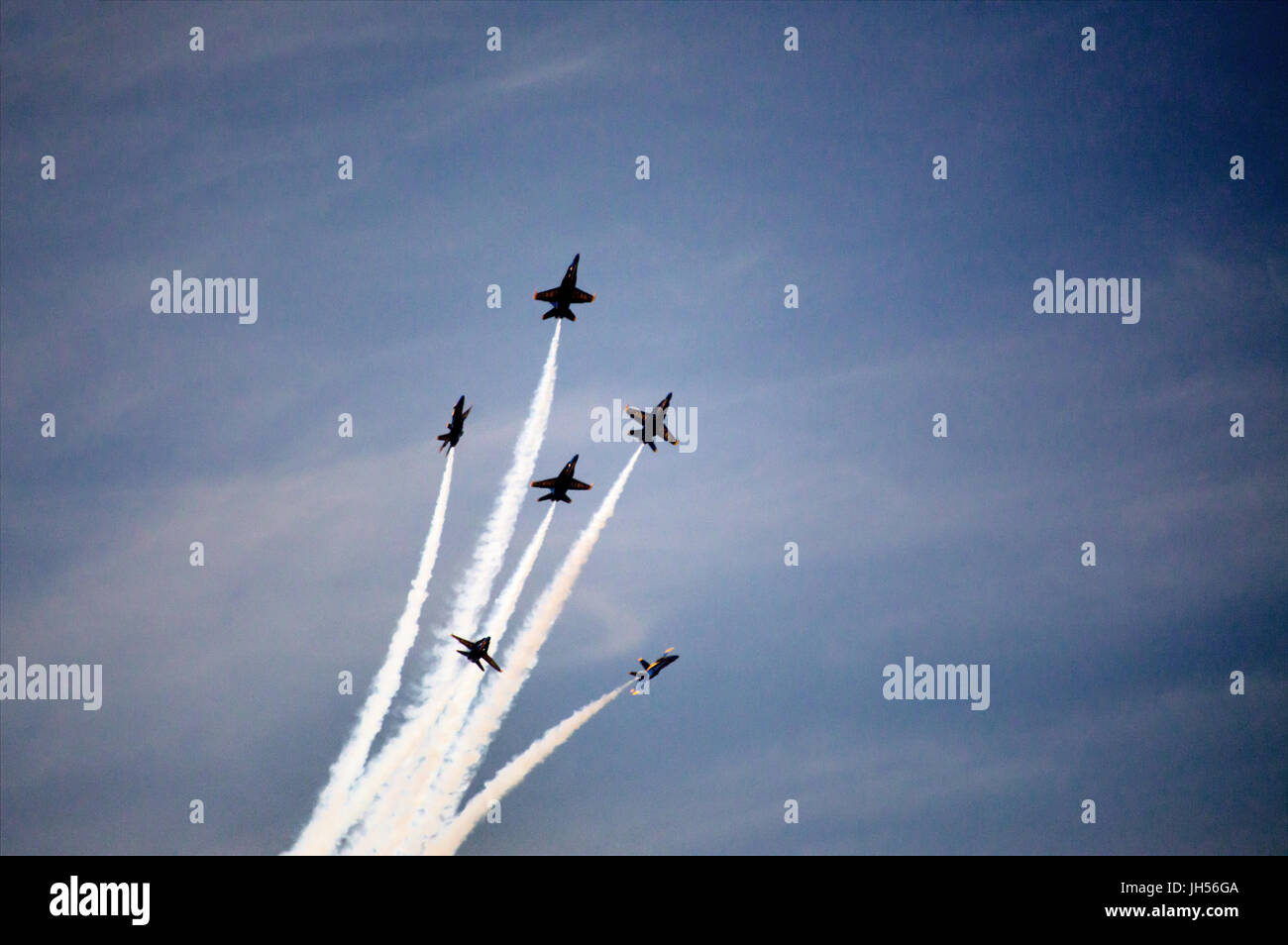 Six blue angel jets flying in formation over their home base in Florida