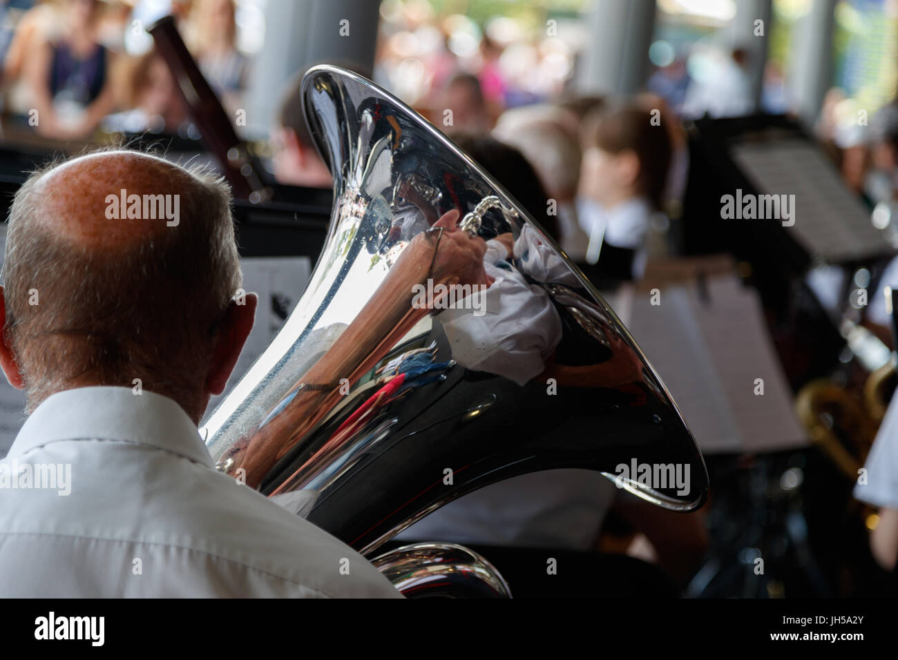 Tuba player reflection in instrument Stock Photo Alamy