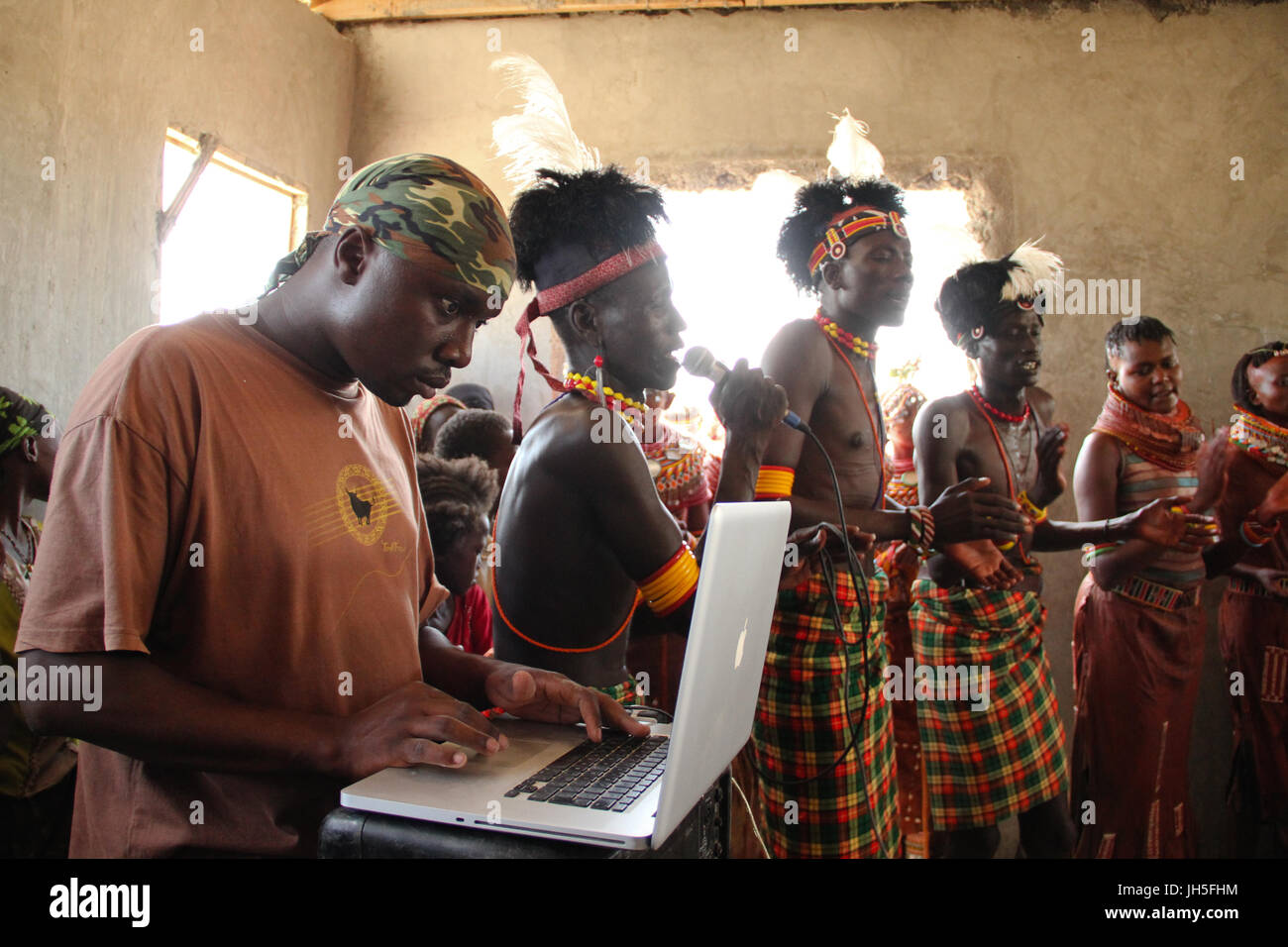 KateBul collaborate with Turkana & Samburu musicians. KateBul, Nairobi-based band teamed up with various communities groups from the Loiyangaleni area a concert on the final day of the annual lake Turkana Festival. Credit: David Mbiyu/Alamy Live News Stock Photo