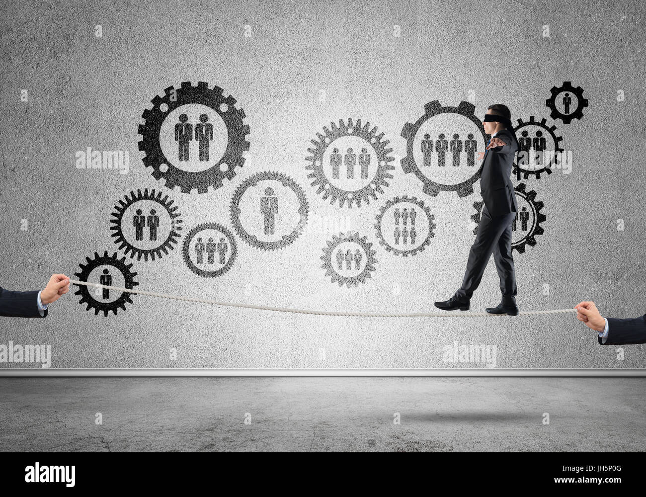 Business concept of risk support and assistance with man balancing on ...