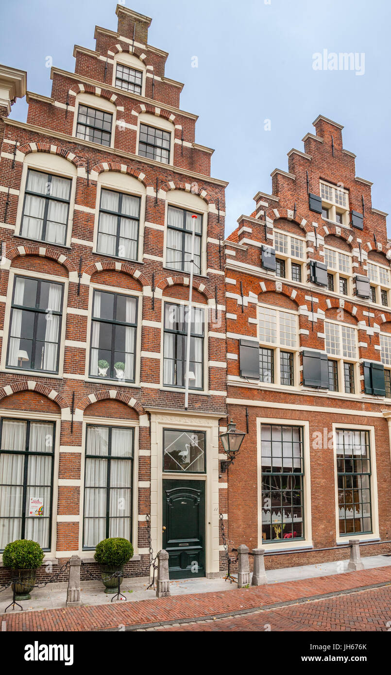 Netherlands, South Holland, Leiden, traditional red brick buildings with crow-stepped gable at Steenschuur Stock Photo