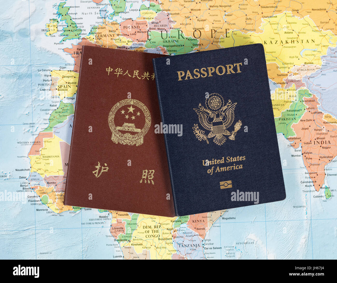 Multiple national passports for world travel Stock Photo Alamy