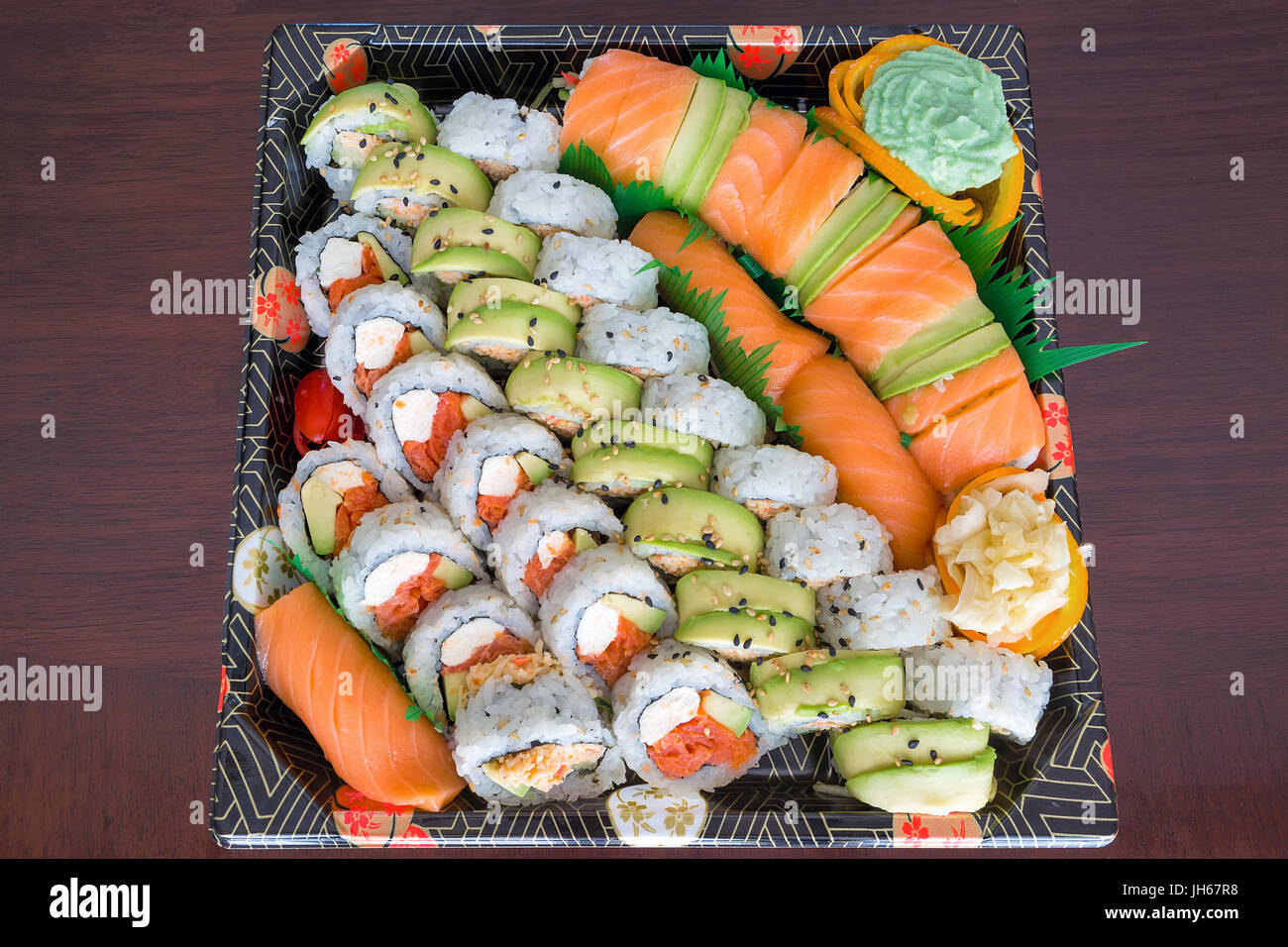 https://c8.alamy.com/comp/JH67R8/sushi-party-platter-with-fresh-raw-smoked-salmon-california-caterpillar-JH67R8.jpg