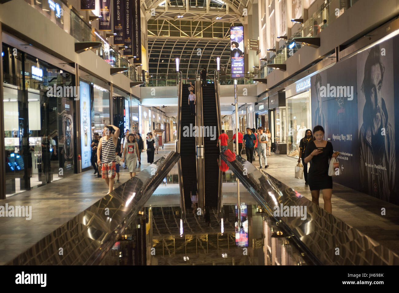 28.04.2017, Singapore, Republic of Singapore, Asia - A view along the shopping arcade of 'The Shoppes' shopping mall. Stock Photo