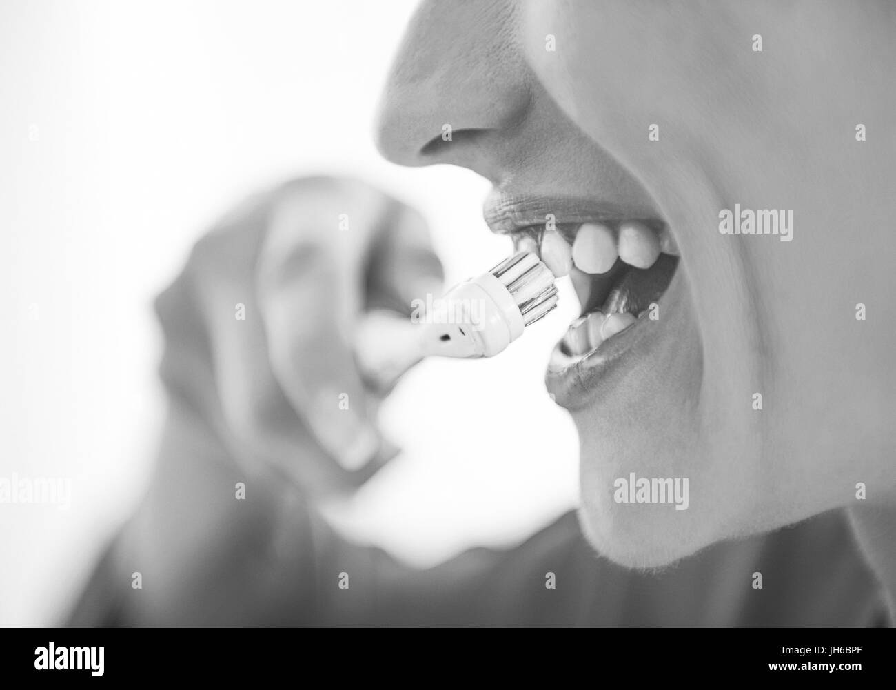 Woman brush teeth morning Black and White Stock Photos & Images - Alamy