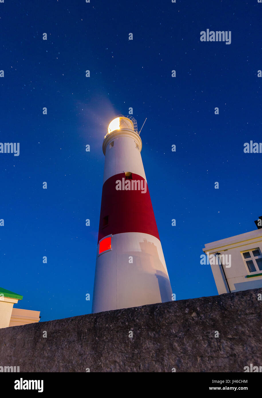Stars above the iconic lighthouse at Portland Bill on a clear spring night along the Jurassic Coast in Dorset, England, UK Stock Photo