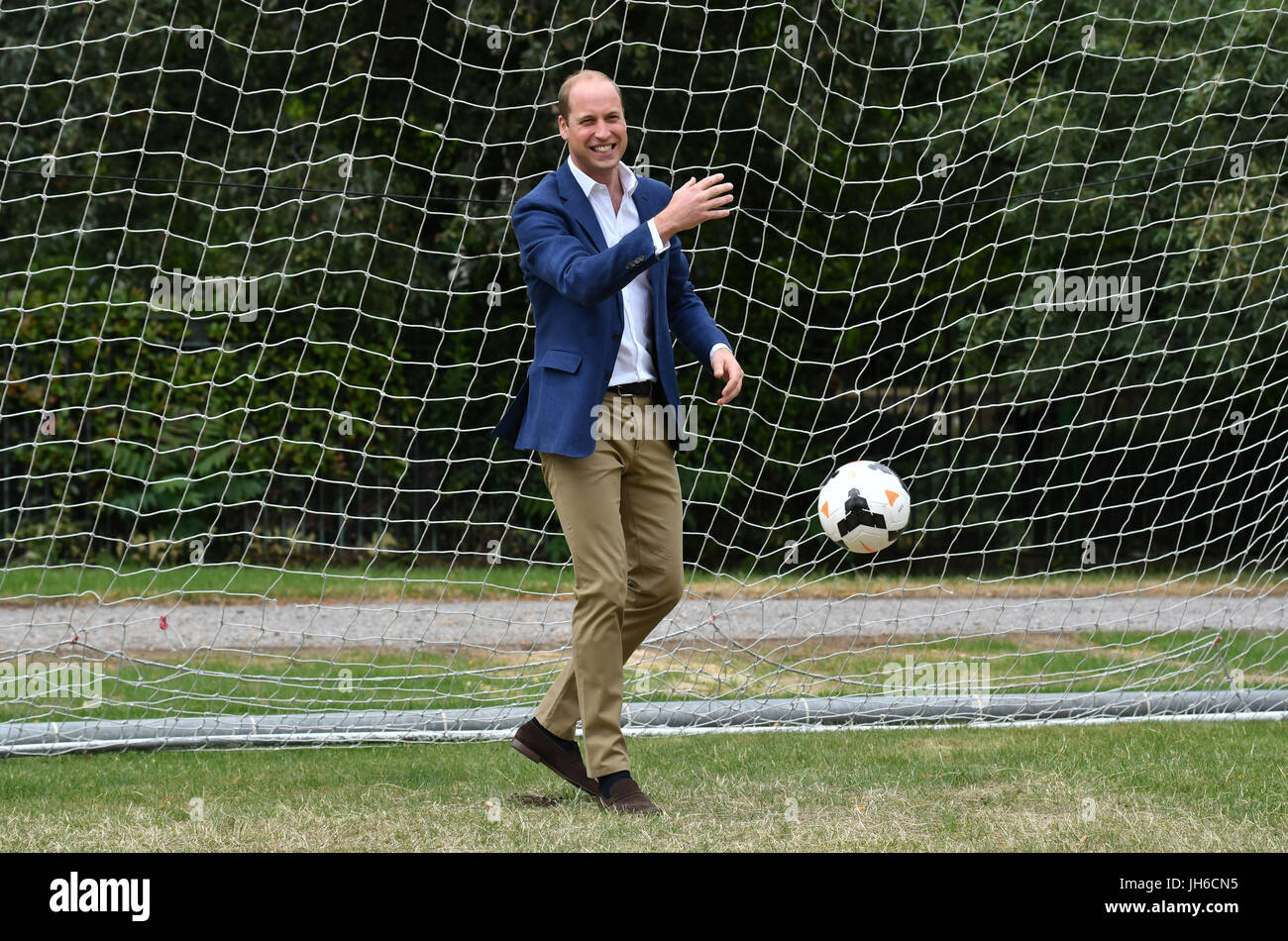The Duke of Cambridge goes in goal as he hosts a reception for the England Women football team at Kensington Palace in London. Stock Photo