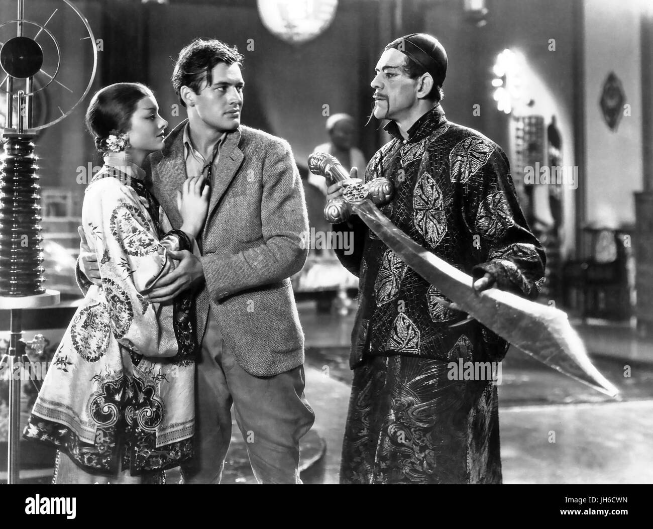 THE MASK OF FU MANCHU 1932 MGM film with from left: Myrna Loy, Charles Starrett, Boris Karloff Stock Photo
