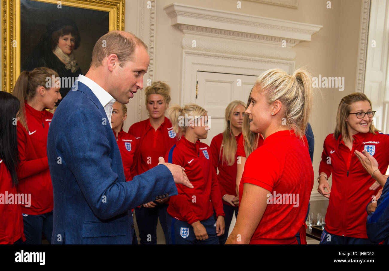 The Duke of Cambridge meets England Women football team captain Steph Houghton during a reception for the England Women football team at Kensington Palace in London. Stock Photo