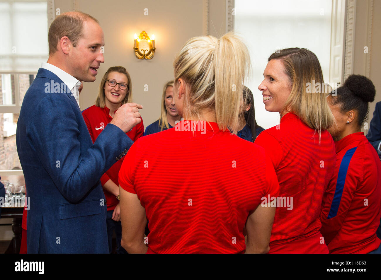 The Duke of Cambridge meets members of the England Women football team during a reception for the England Women football team at Kensington Palace in London. Stock Photo