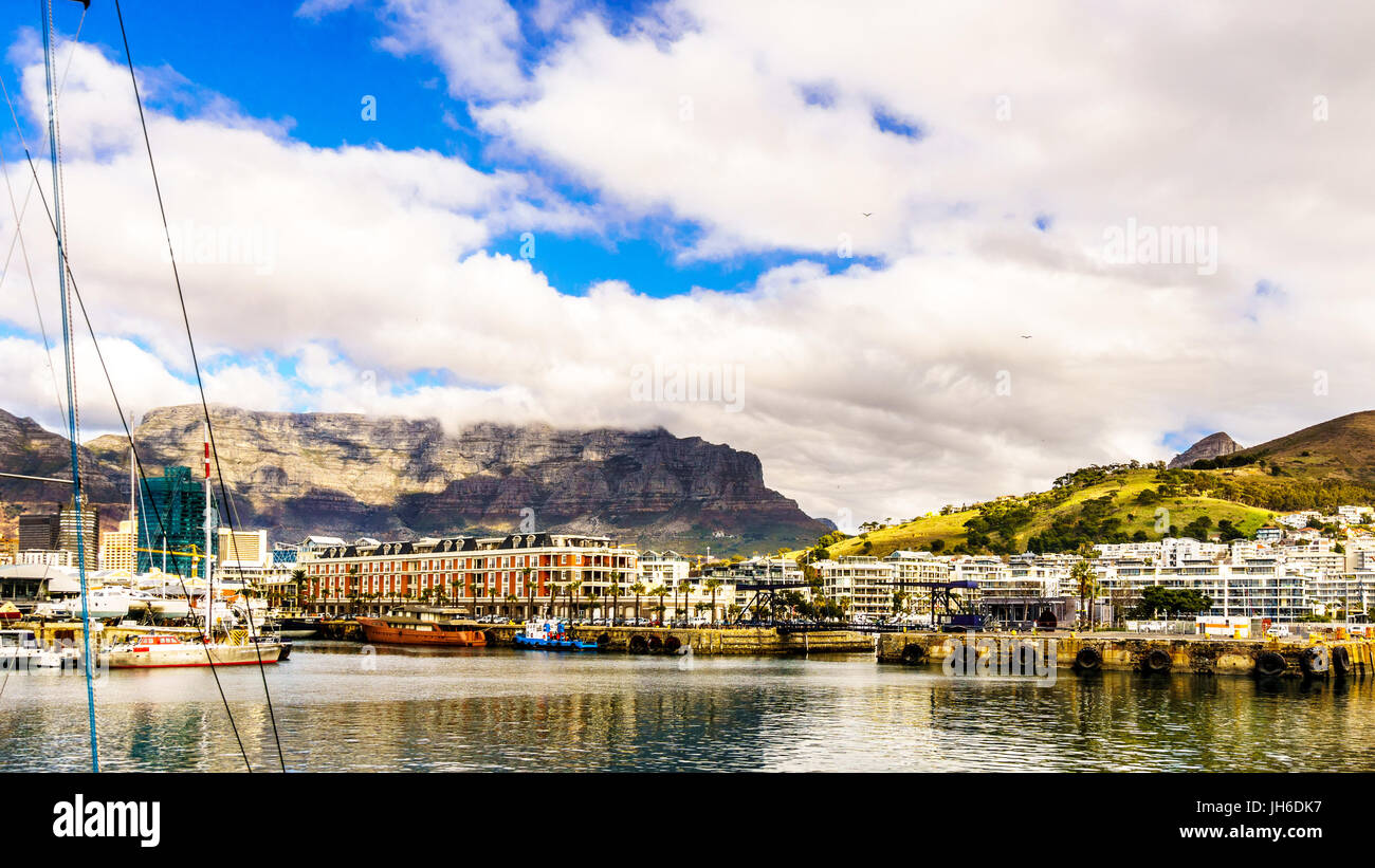 Cloud blanket over Table Mountain as seen from the Victoria and Albert Waterfront in Cape Town South Africa Stock Photo