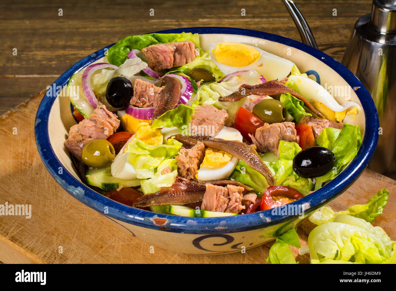 Nice Cote d'Azur France - Salade Nicoise:  Lettuce, tomato, onion, cucumber, egg, olives tinned tuna, tinned anchovies and olive oil Stock Photo