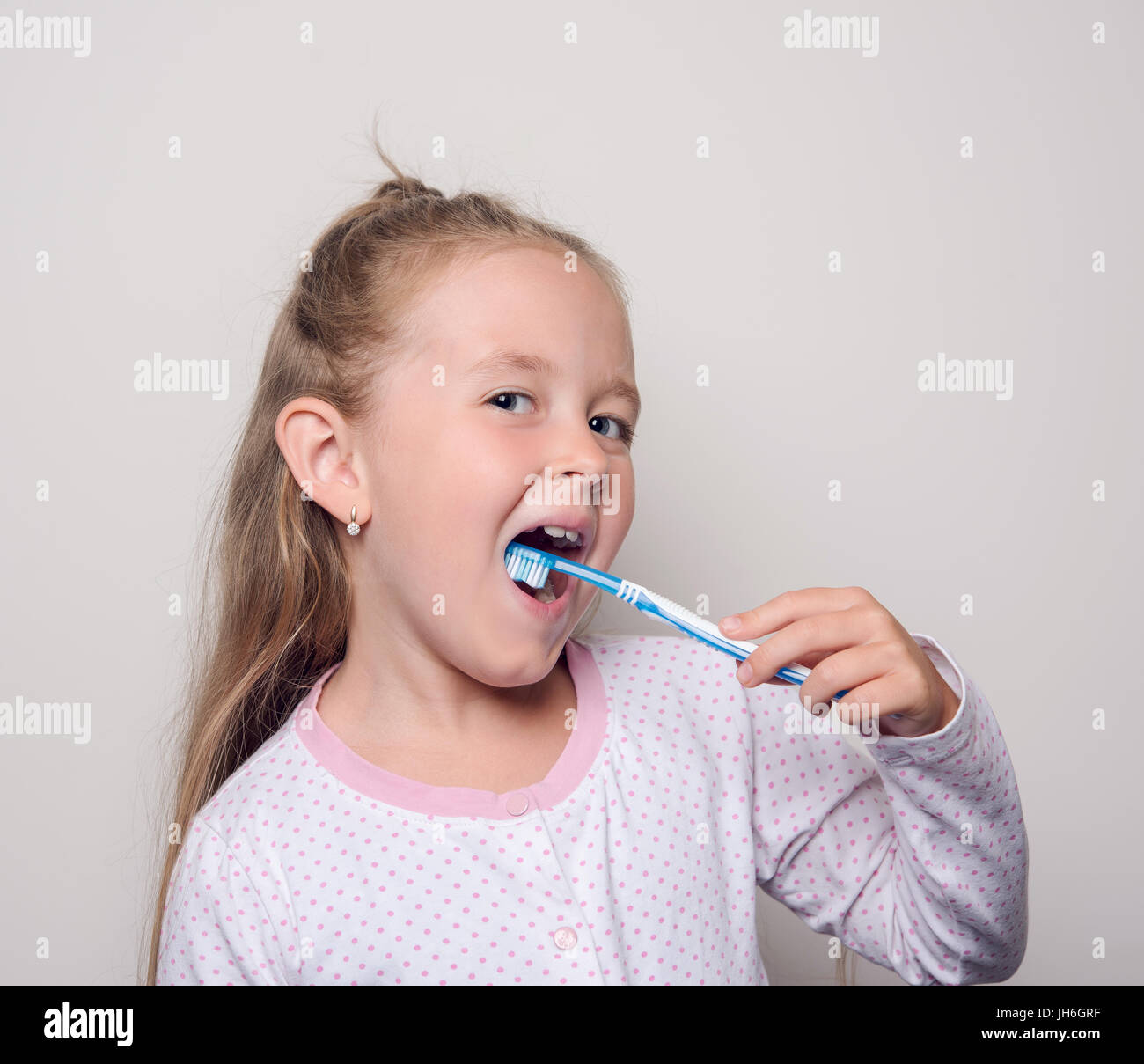 child brushing her teeth in the morning Stock Photo Alamy