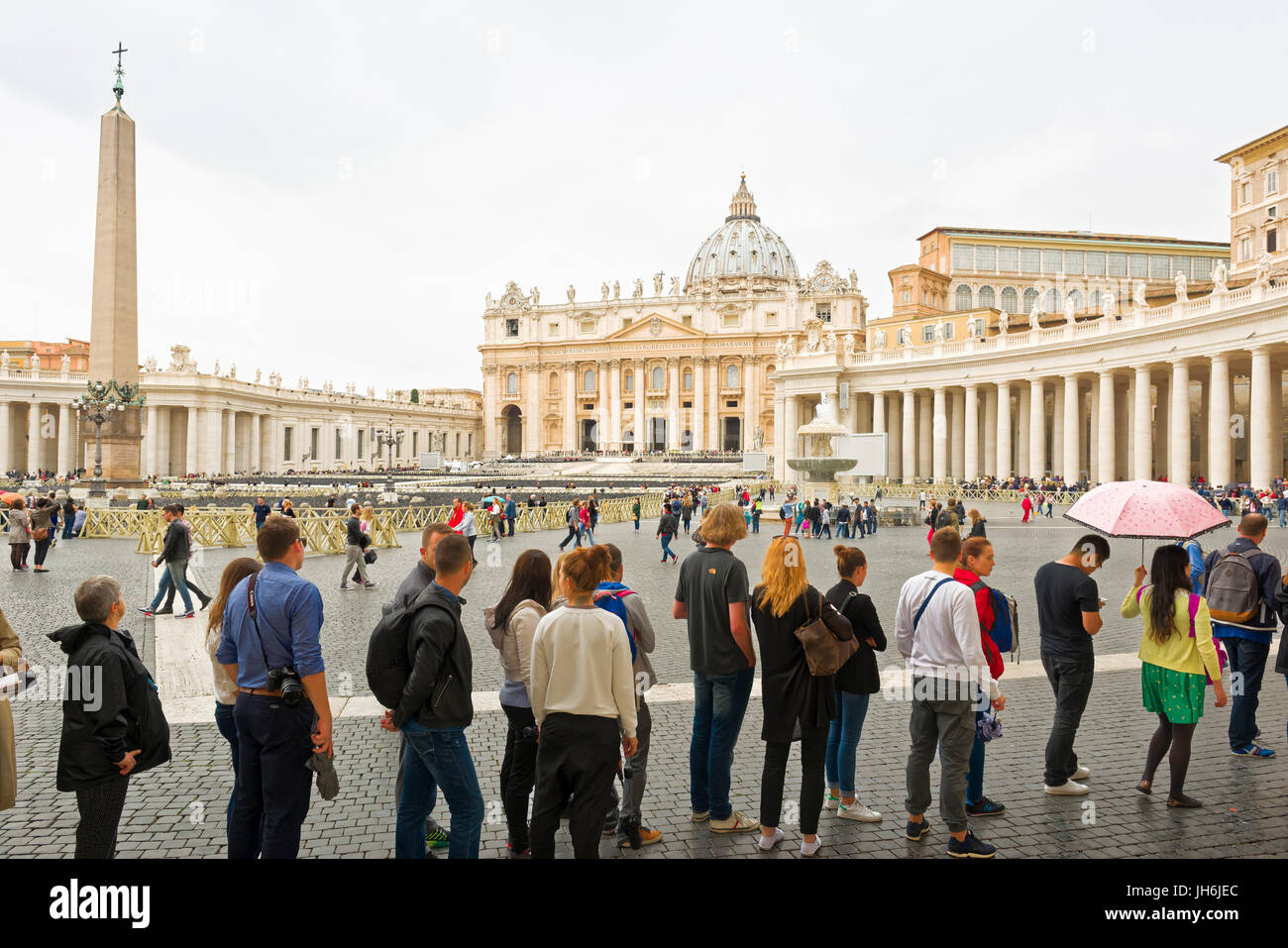 Tourism umbrella vatican queue hires stock photography and images Alamy