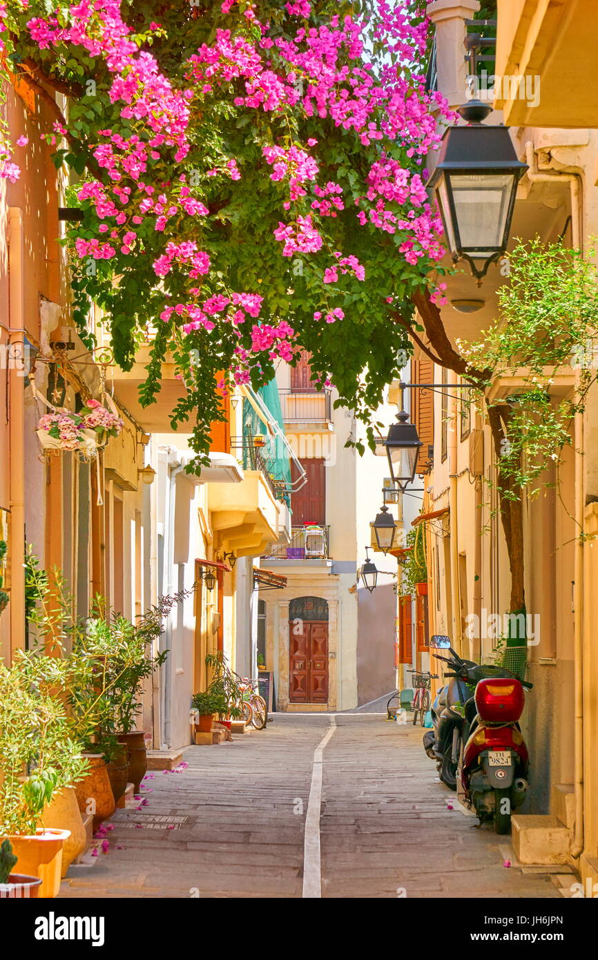Blooming flowers decoration. Rethymno old town, Crete Island, Greece Stock Photo