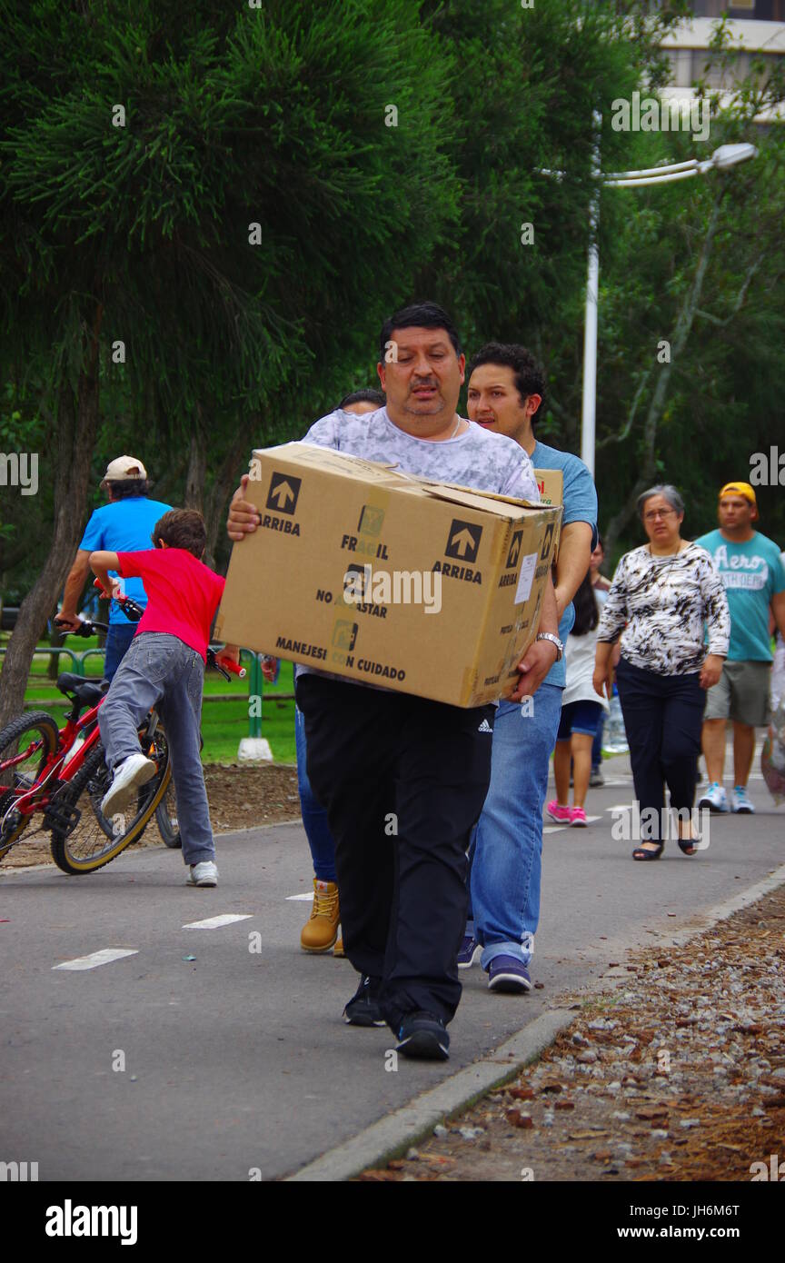 Quito, Ecuador April,17, 2016 Unidentified people carrying food