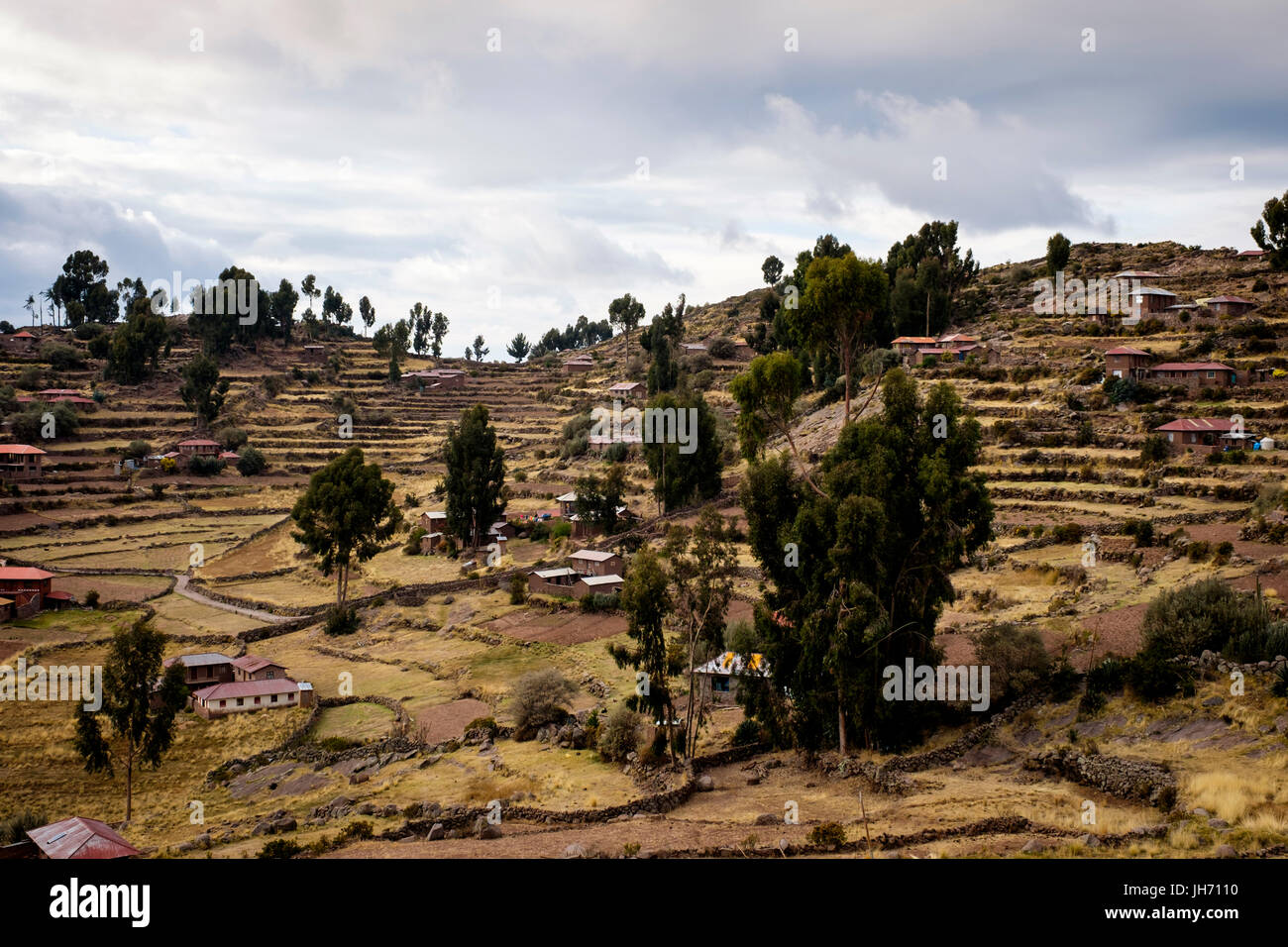 PUNO, PERU - CIRCA OCTOBER 2015: Houses of the Island of Taquile in Lake Titicaca. Stock Photo